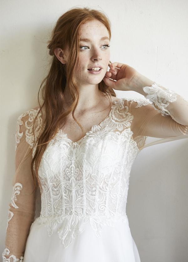 Long Sleeve Sheath Wedding Gown With a See-through Corset